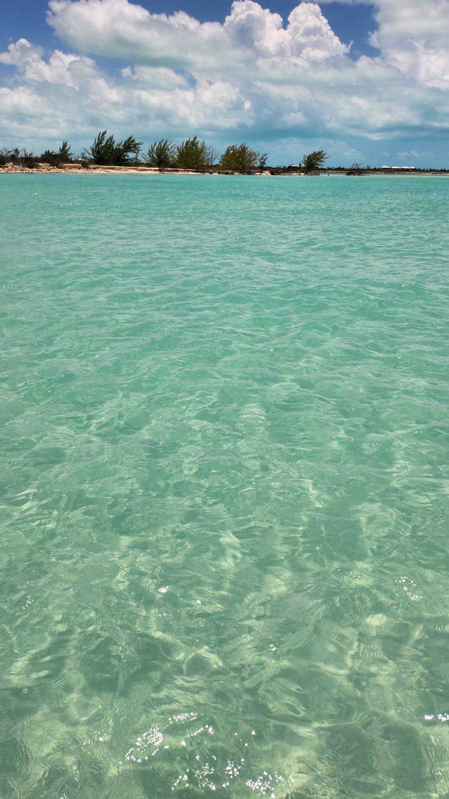 Crystal turquoise water off a quiet cay